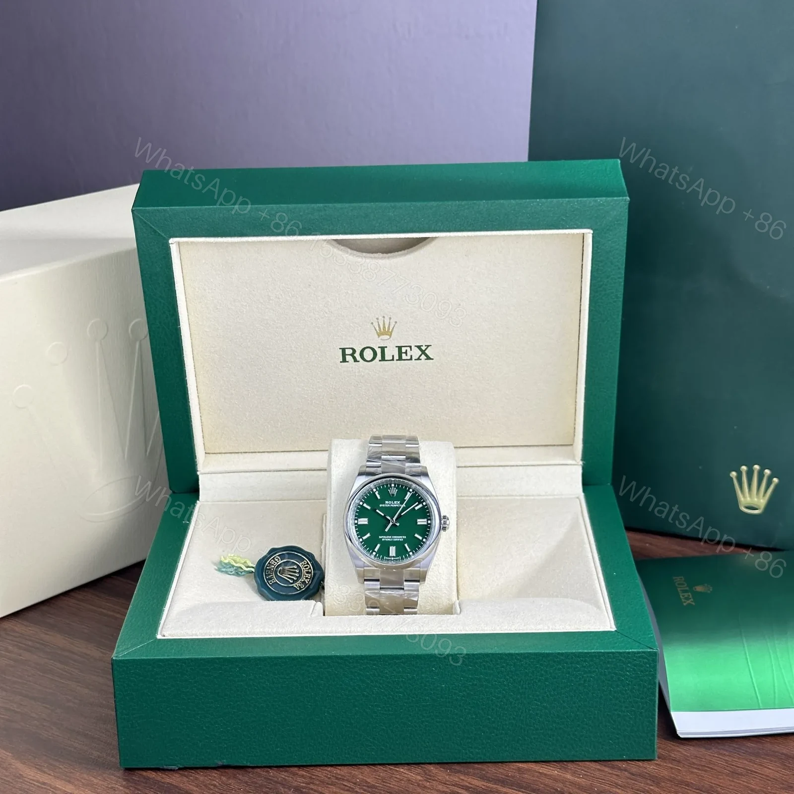 View 8 of Replica Rolex Oyster Perpetual Green Dial 124300 41 mm
