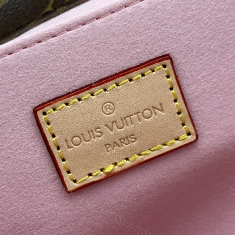 View 8 of Louis Vuitton Pochette Métis Monogram Coated Canvas 25Cm M47203