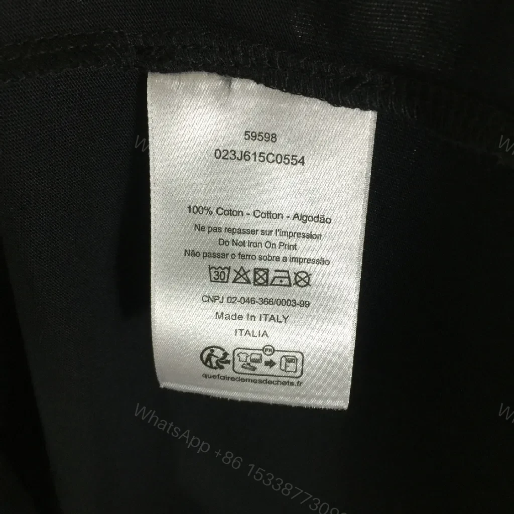 View 7 of Minimalist Black Tee Dress: Subtle Dior Branding, Versatile Style