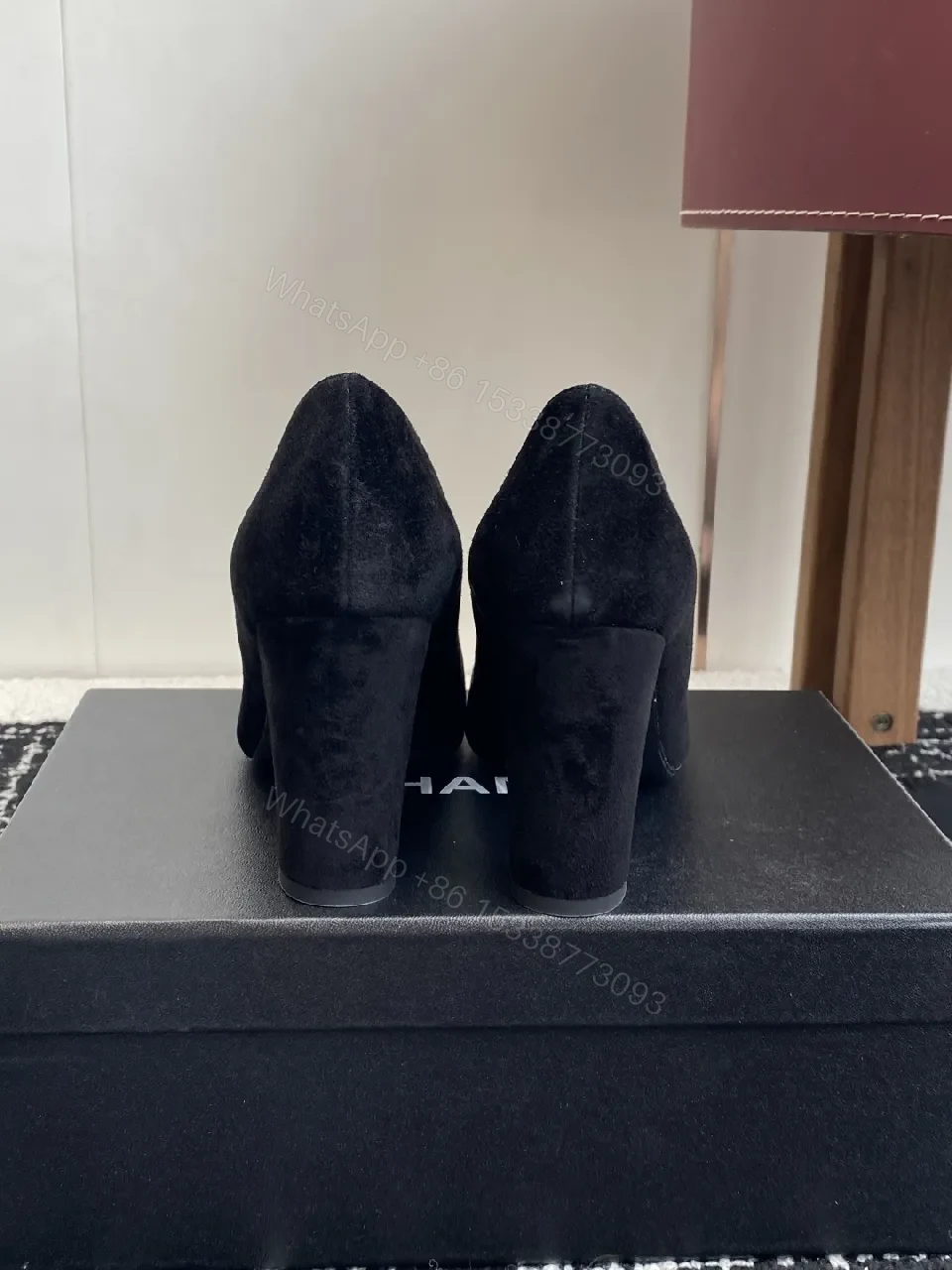 View 3 of Elegant Black Suede Pumps with Logo Detail Leather Heel