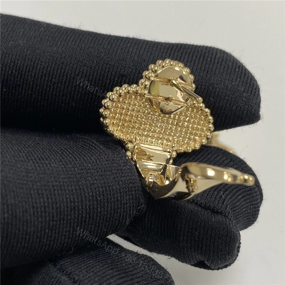 View 3 of Van Cleef Arpels Magic Alhambra Hammered Earrings VCARO1II00