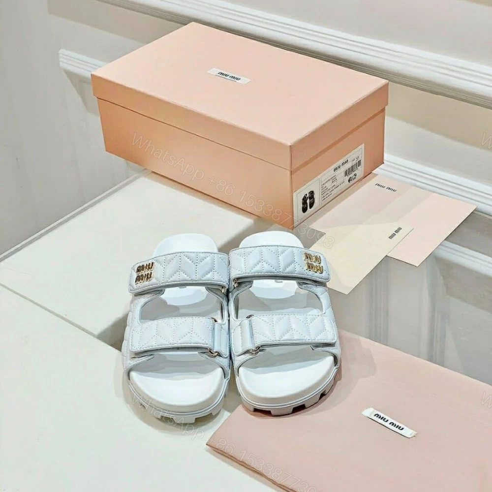 View 4 of MIUMIU MATELASSE NAPPA LEATHER SLIDES WHITE