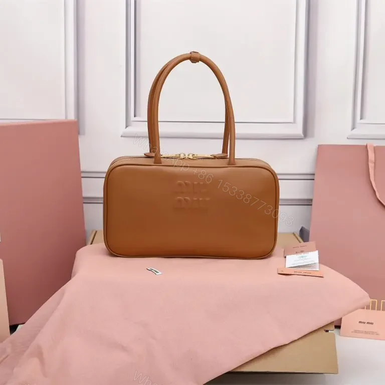 高仿miumiu*5BB172壓紋LOGO手提包小牛皮白蘭地免檢版 — view 1
