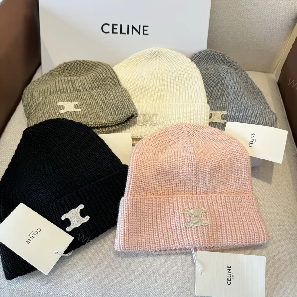 View 4 of Cream Knit Beanie + Ribbed Material + Minimalist Style + Subtle Monogram + Beanie