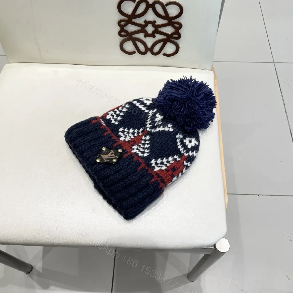View 2 of Navy Knit Beanie with Pom – Luxe Designer-Inspired Warmth