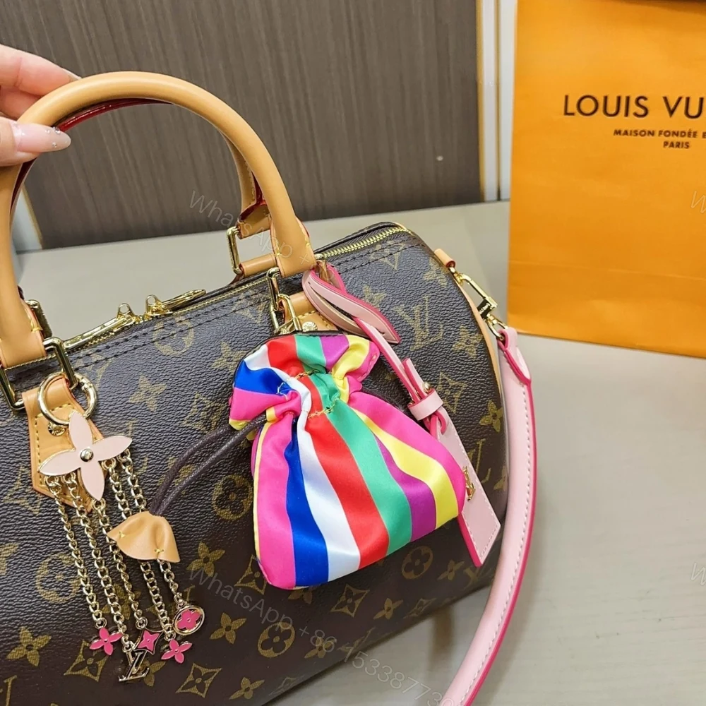 View 5 of Louis Vuitton Speedy Soft 30 Monogram Canvas Brown 30Cm M26498