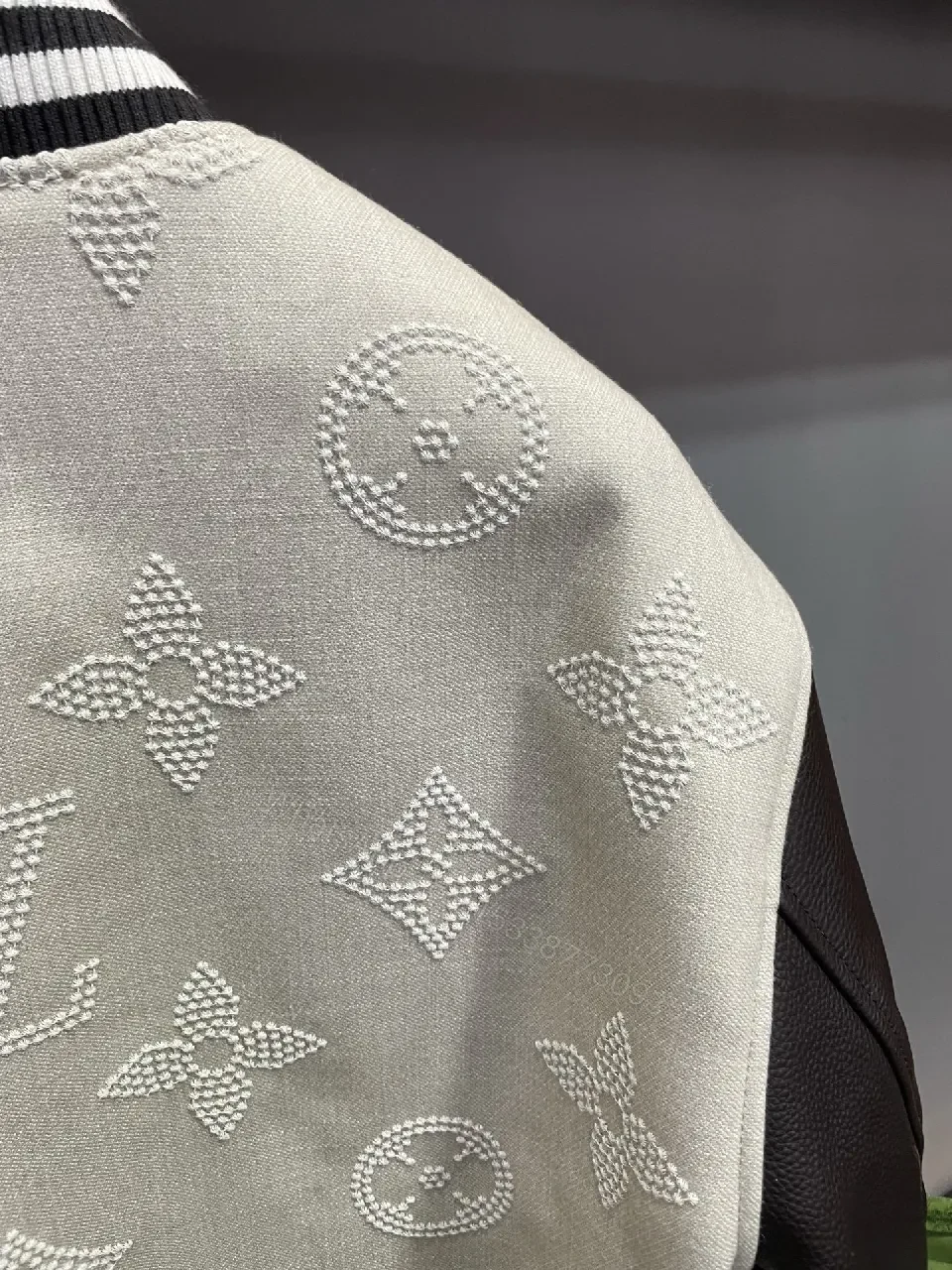 View 3 of Textured Monogram Varsity Jacket: Modern Luxury, All-Day Comfort