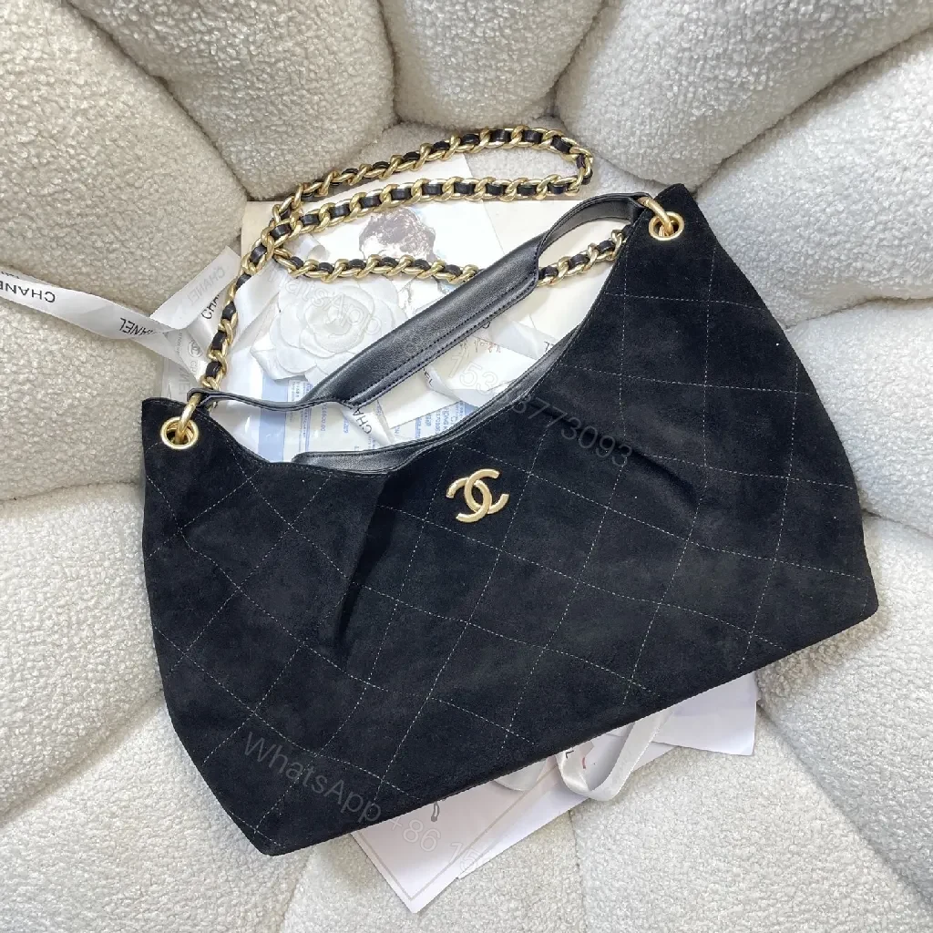 View 2 of Quilted Black Bag with Gold Chain, Top Handle, Compact