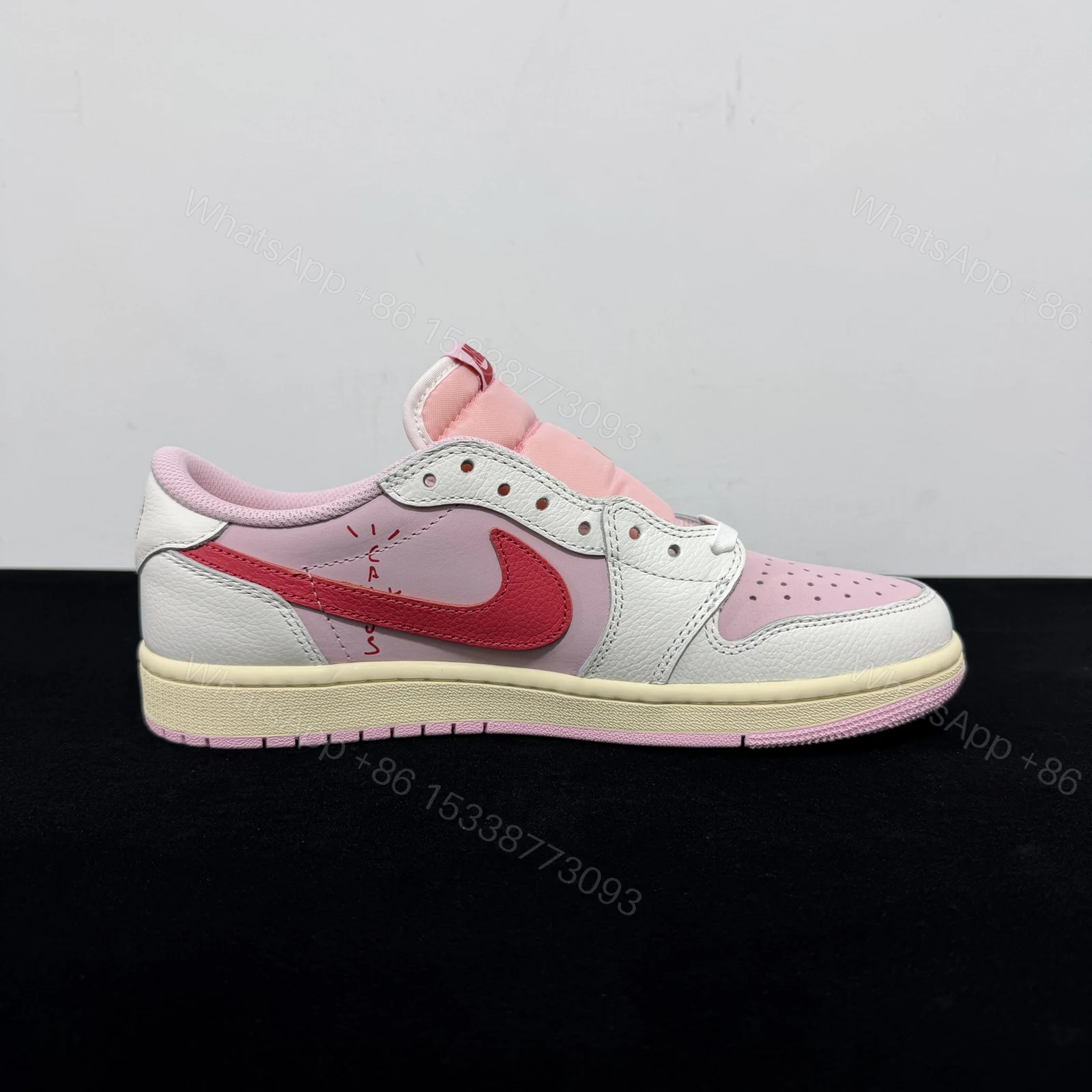 View 2 of Travis Scott x Air Jordan 1 Tropical Pink Reps