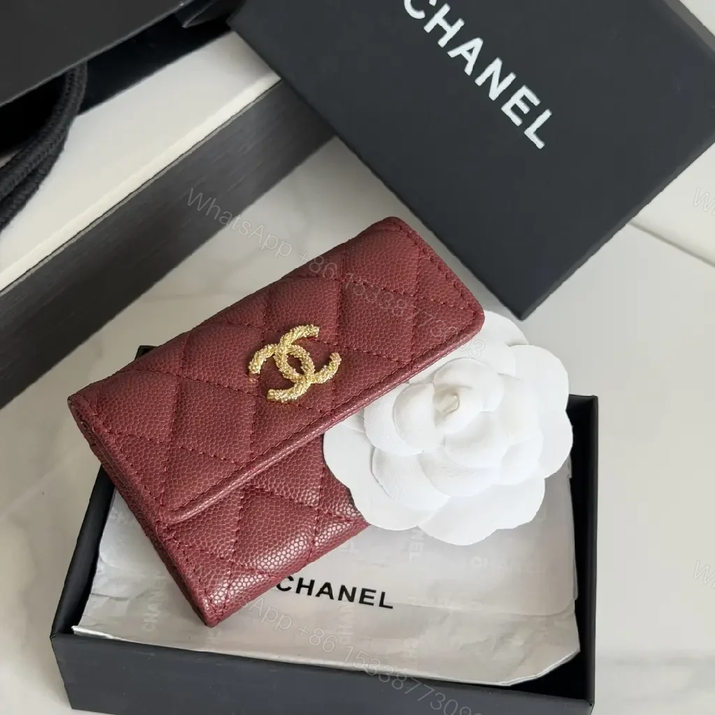 View 12 of Burgundy Quilted Leather Wallet — Gold Logo, Compact Bifold