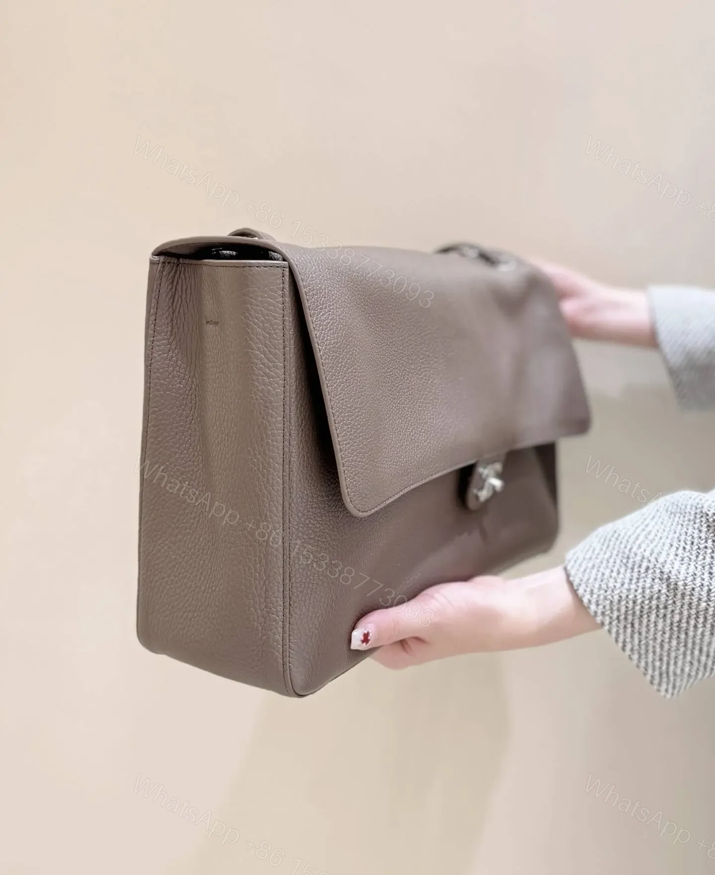 View 2 of Chanel Maxi Flap bag in Taupe Grained Calfskin SS26 Collection