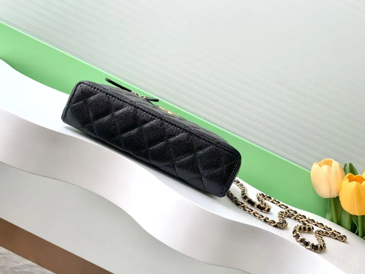 View 3 of Quilted Black Bag with Gold Hardware - Chic Compact Style