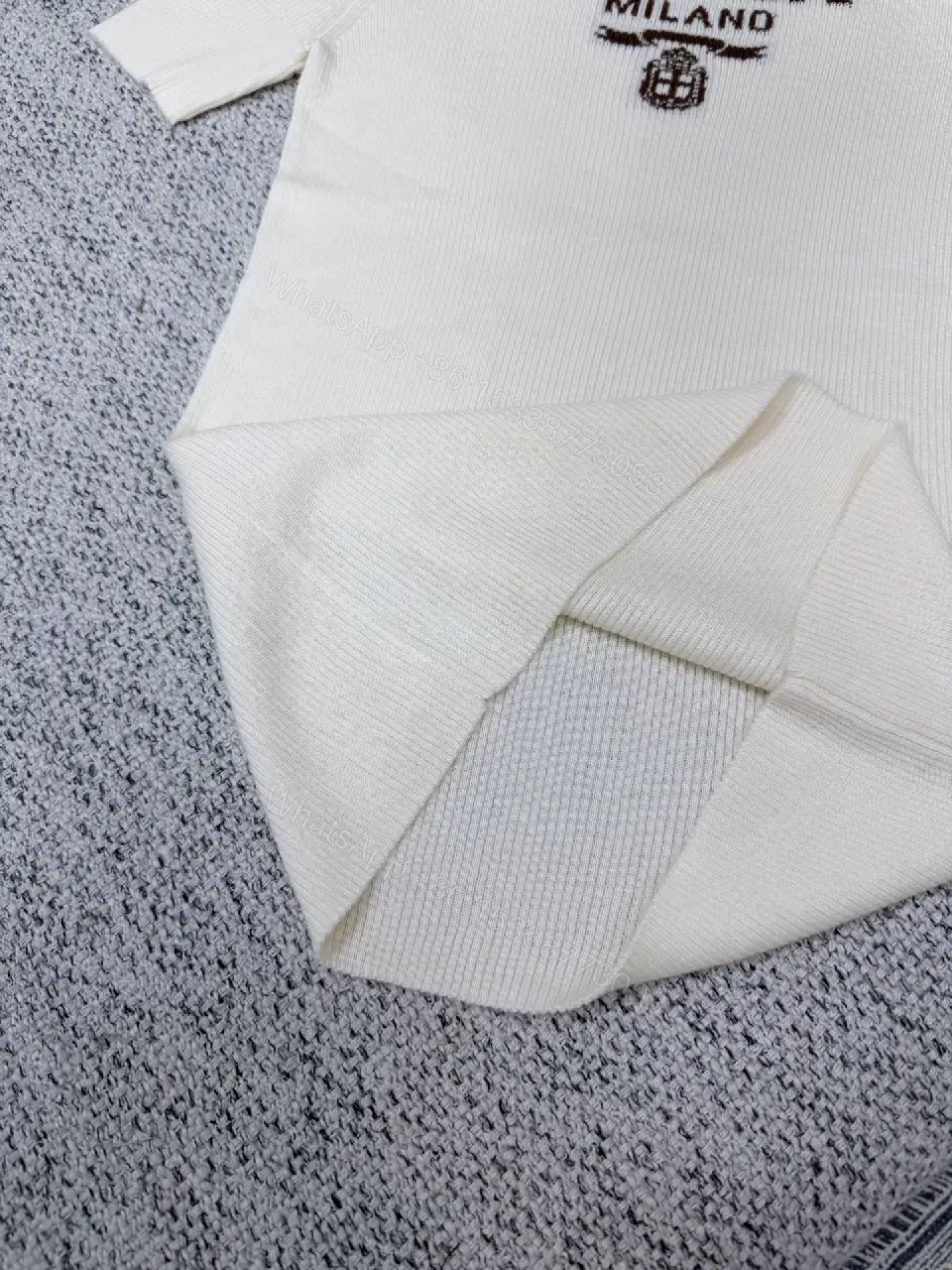 View 9 of Minimalist Ivory Knit Tee with Prominent Branding