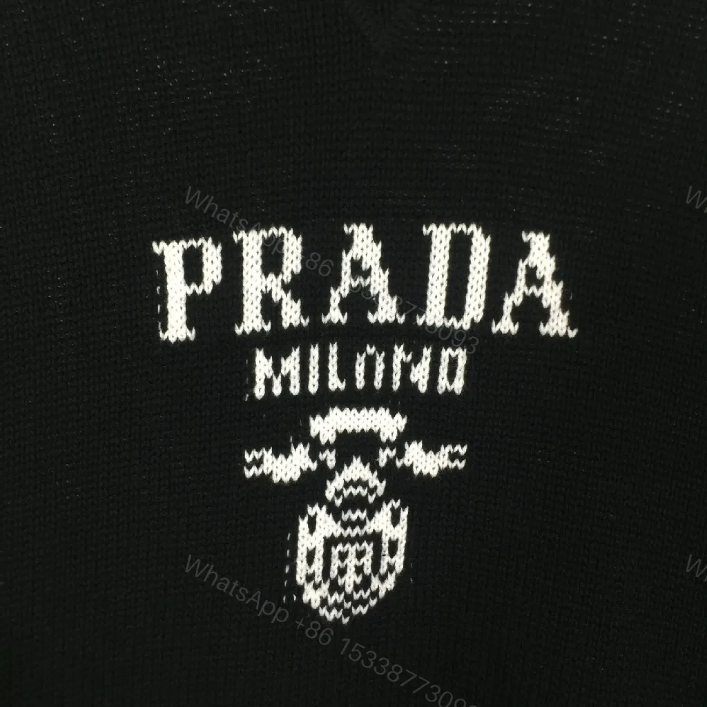 View 8 of Leather-Feel Knit Crewneck with Crest: Subtle Luxury Comfort