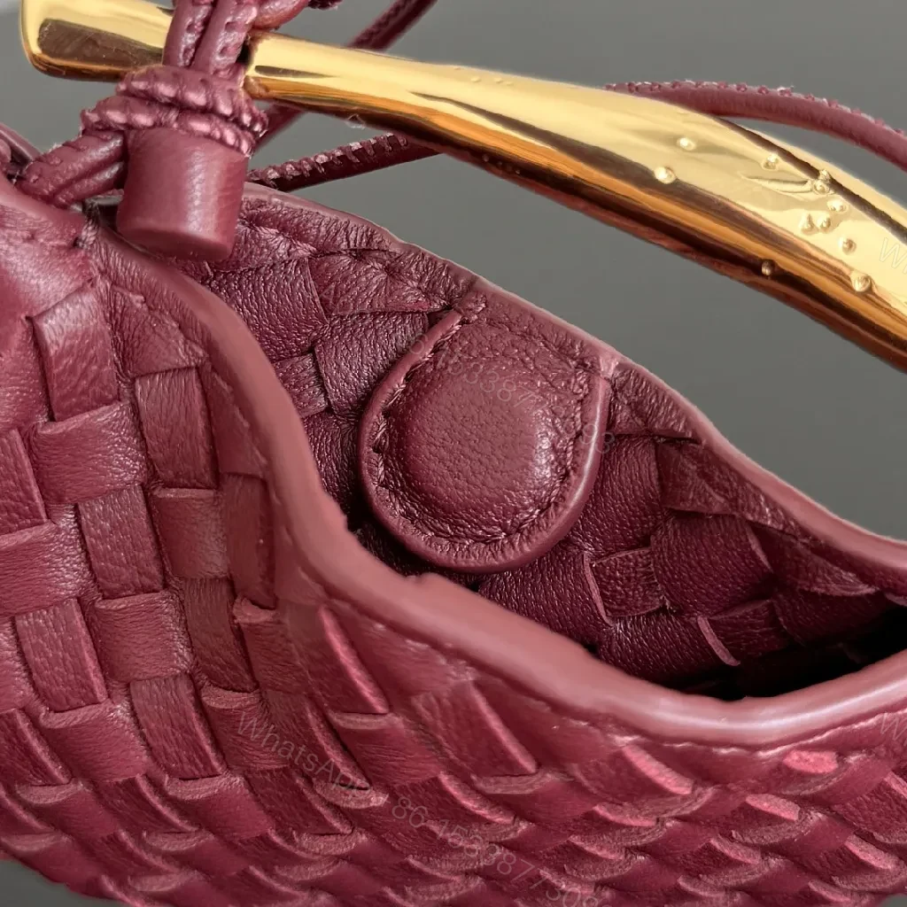 View 4 of Textured Plum Mini Bag: Handwoven Leather, Luxe Compact