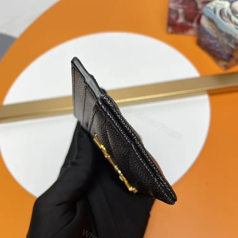 View 2 of Chic Black Textured Leather Wallet with Gold YSL Logo