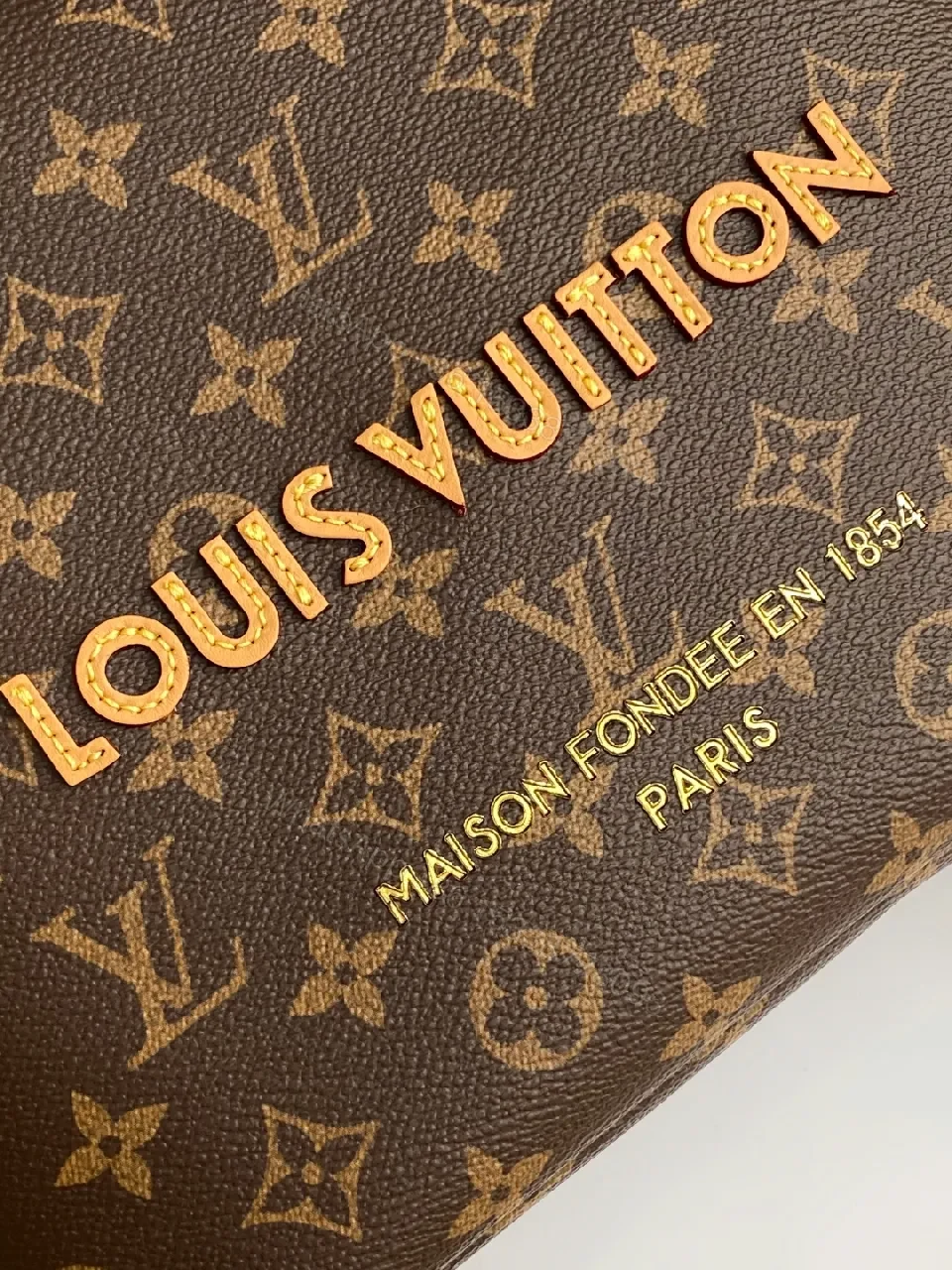 View 3 of Structured Monogram Canvas Tote: Modern Luxury, Everyday Versatility