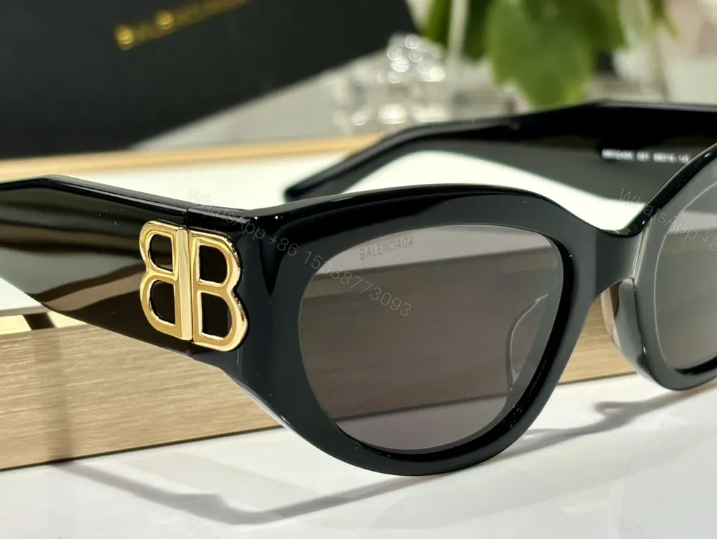 View 4 of Bold Black Frames with Gold BB Emblem Sunglasses