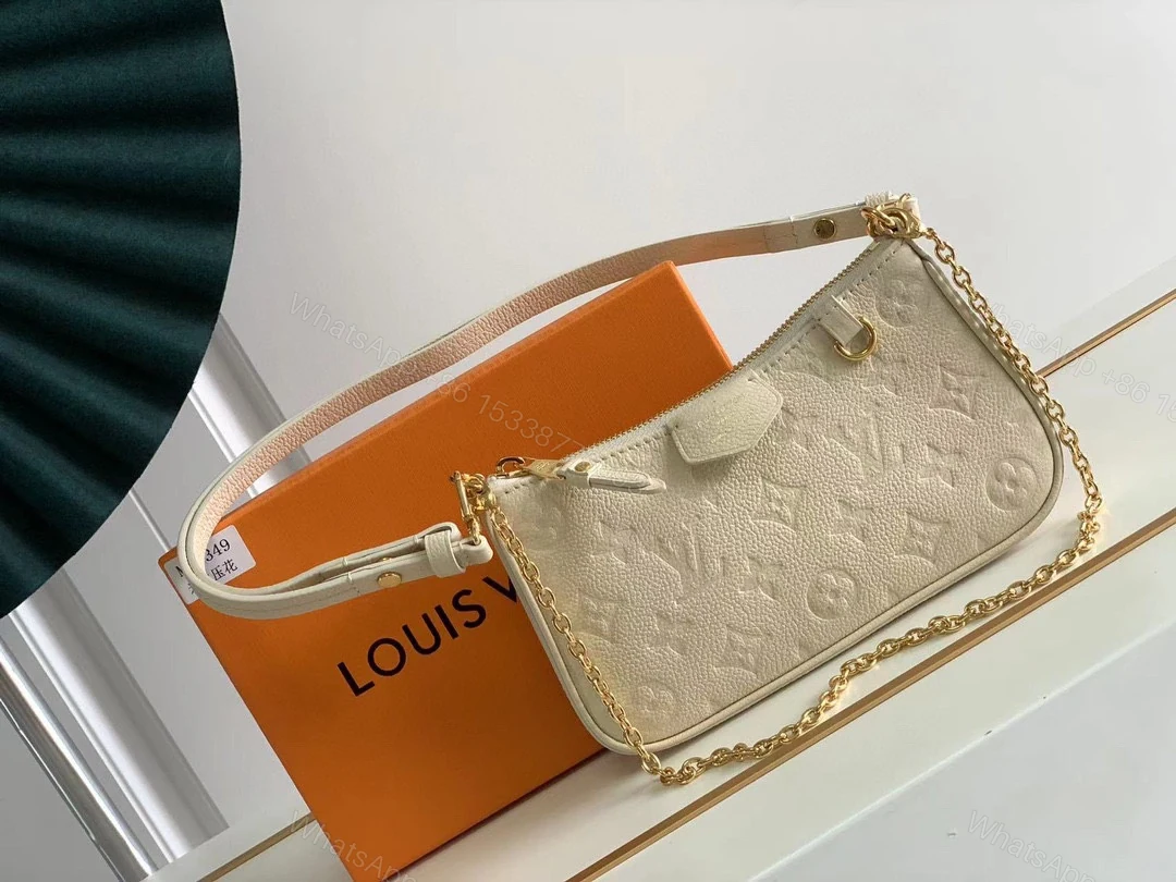 LV 一比一 Multi Pochette Accessoires 白色壓花腋下包 — view 1