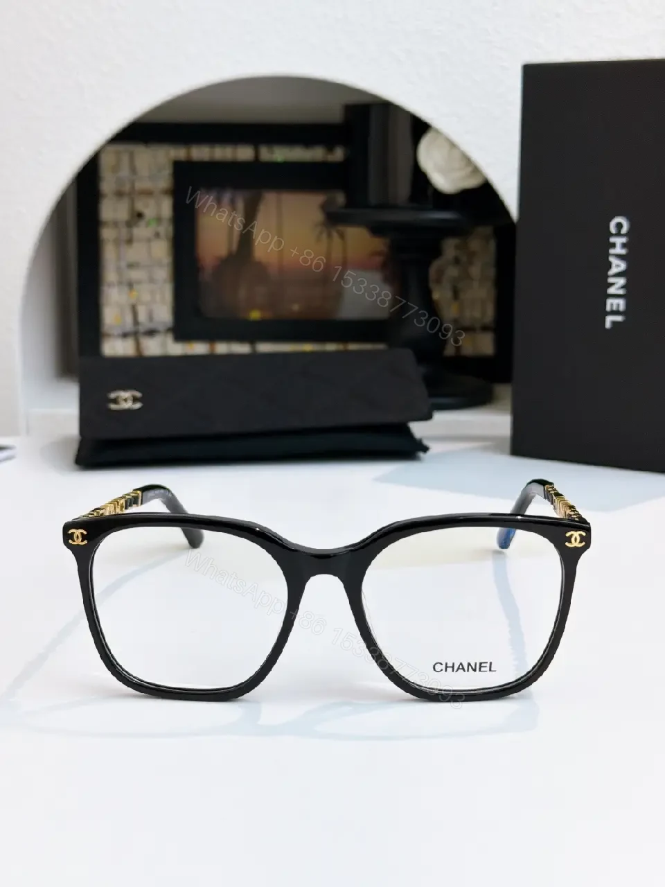 View 3 of Clear Translucent Frame Modern Oversized Sunglasses with CHANEL Accents