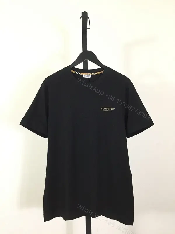 Minimalist Black Cotton Tee, Subtle Logo, Everyday Comfort — view 1