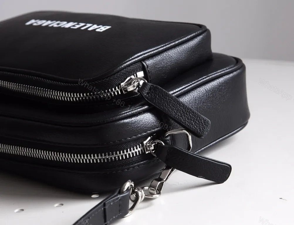 View 8 of Compact Black Leather Crossbody: Bold Logo, Versatile Style