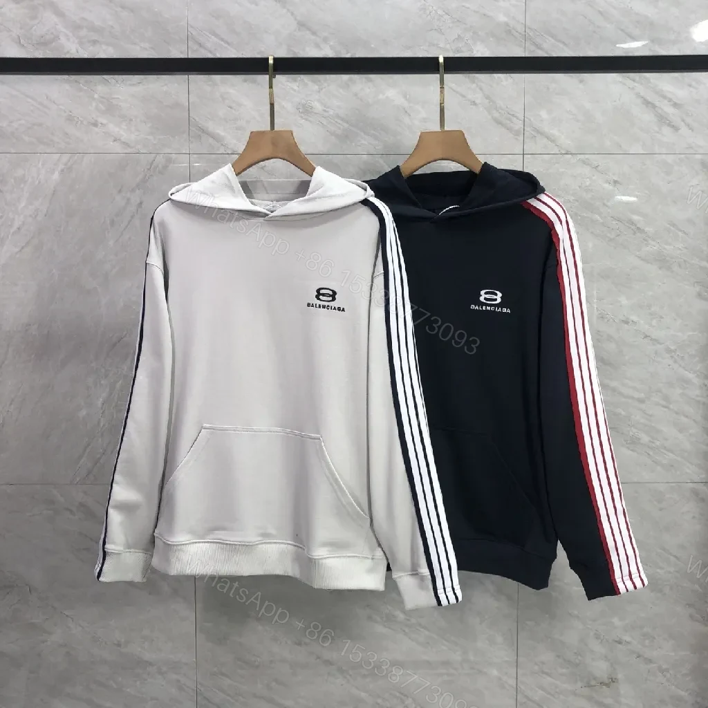 View 5 of Minimalist Sporty Hoodie with Striped Details in Knit Comfort