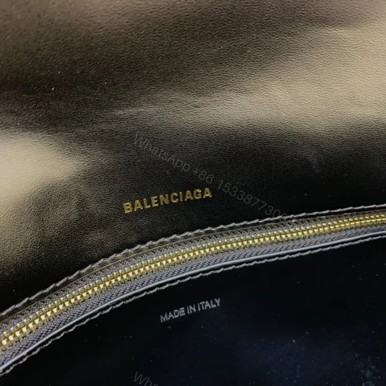 View 4 of Chic Black Leather Crossbody with Bold Gold Hardware Bag