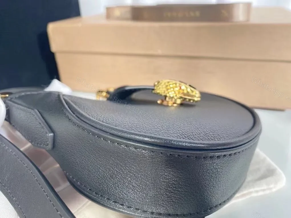 View 2 of Pebbled Leather Saddle Bag: Luxe, Timeless, Day-to-Night Style
