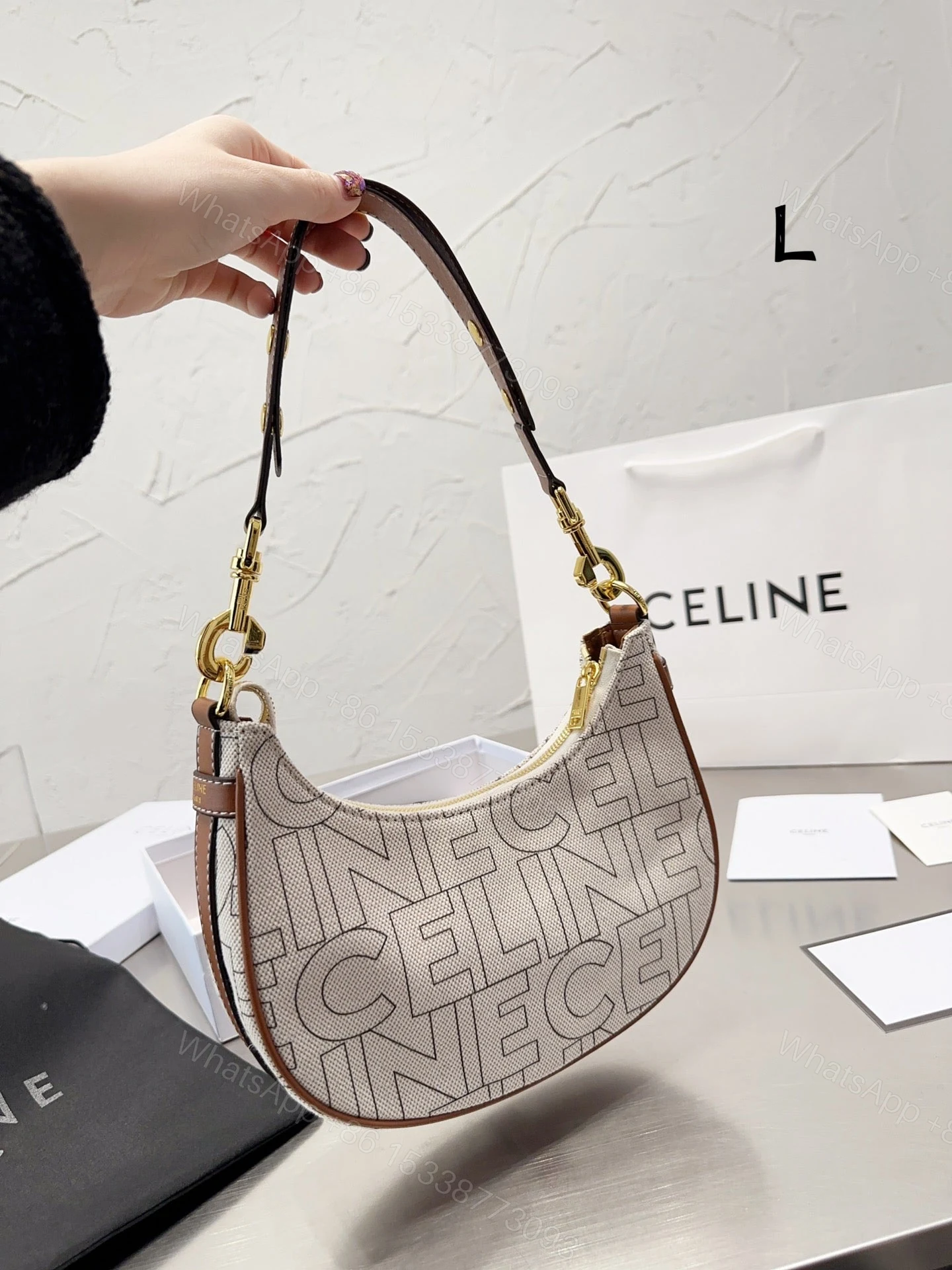 View 4 of CELINE MEDIUM AVA STRAP BAG IN TEXTILE WITH ALL OVER PRINT NATURAL 25CM 196922ERK02NT