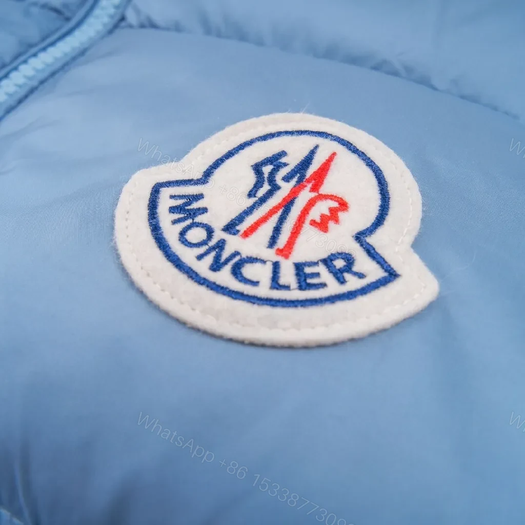 View 8 of Sky Blue Lightweight Puffer Jacket with Premium Patch, Unisex Style