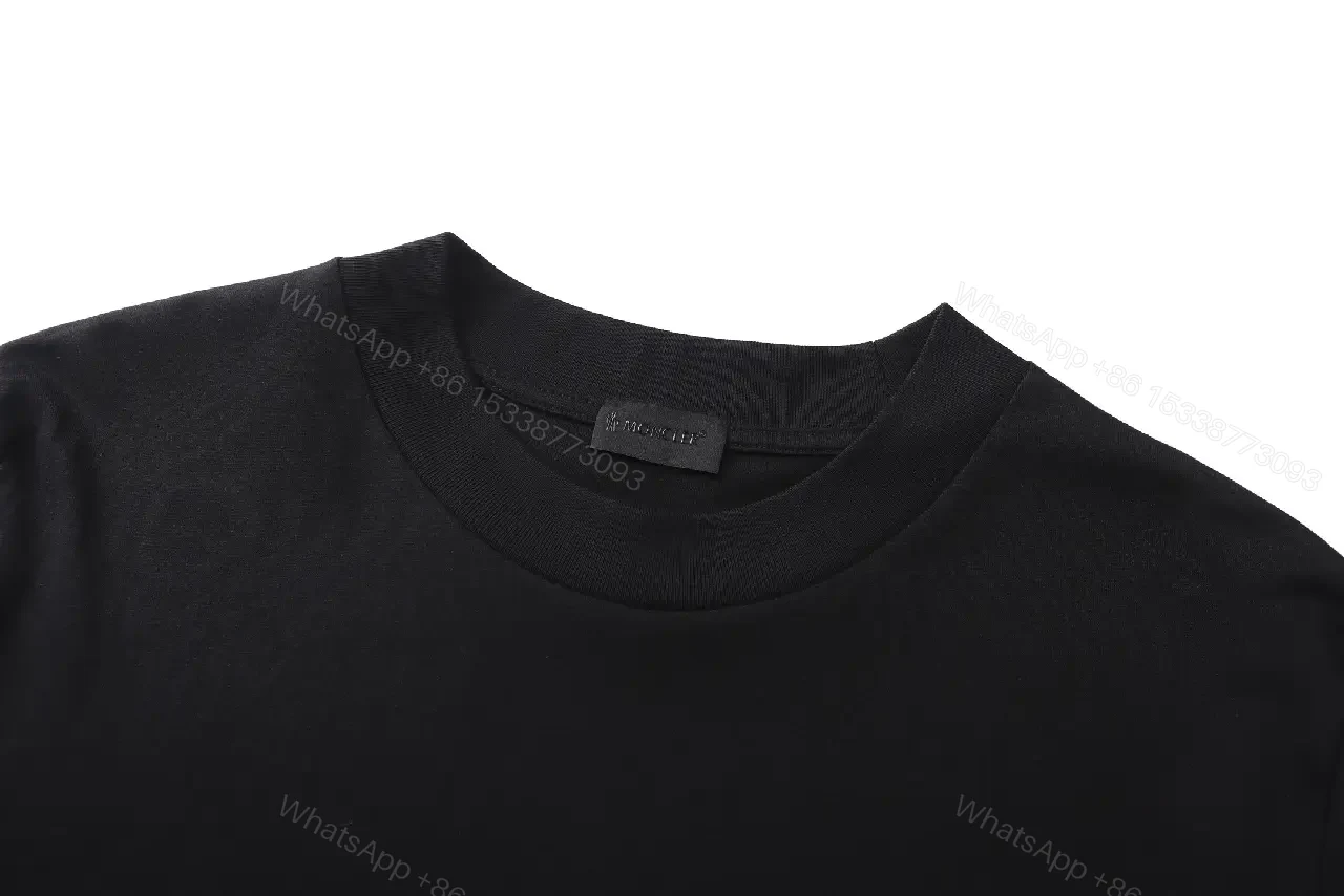 View 10 of Minimalist Black Cotton Tee – Elevated Everyday Essential, Relaxed Fit