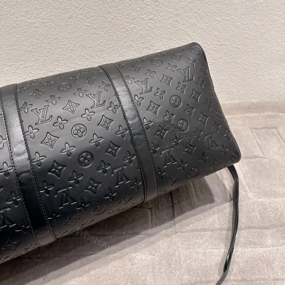 View 7 of Louis Vuitton Keepall Bandoulière 50 Black 50Cm M44810