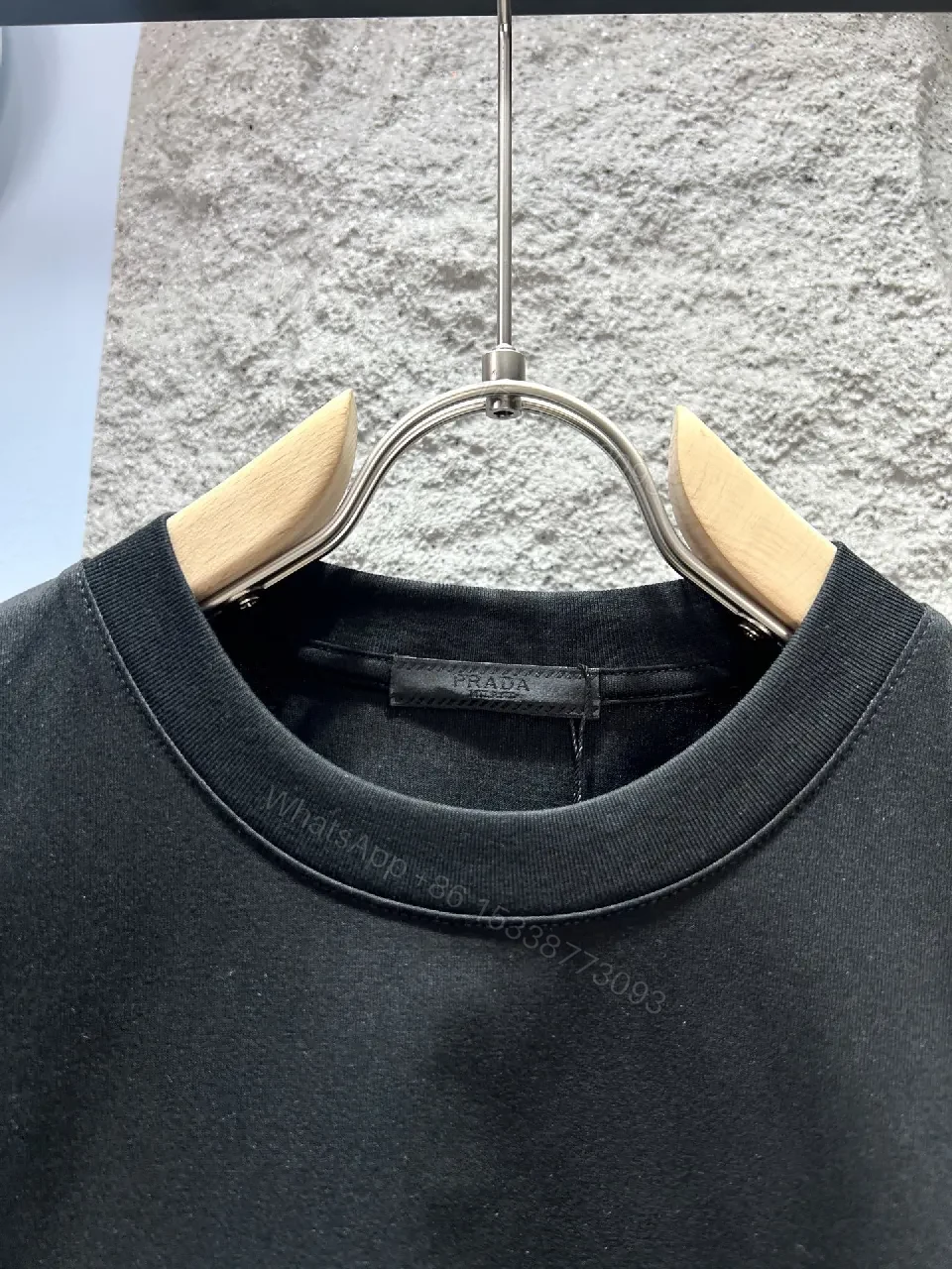 View 2 of Black Graphic Tee: Premium Prada Triangle Logo, Modern Streetwear