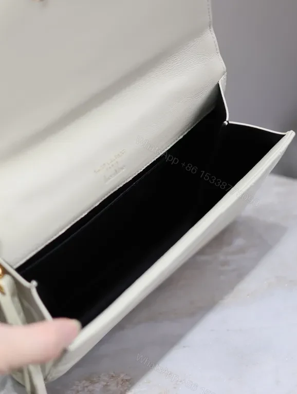 View 9 of Chic Quilted Leather Wallet with YSL Hardware - Luxe Everyday Portfolio