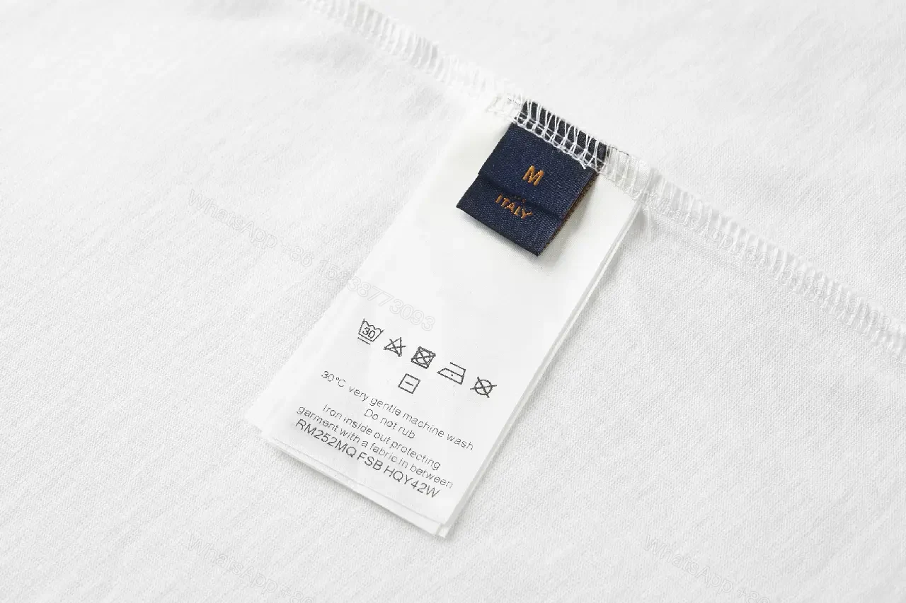 View 2 of White Cotton Graphic Tee: Gradient LV Monogram Pattern Top