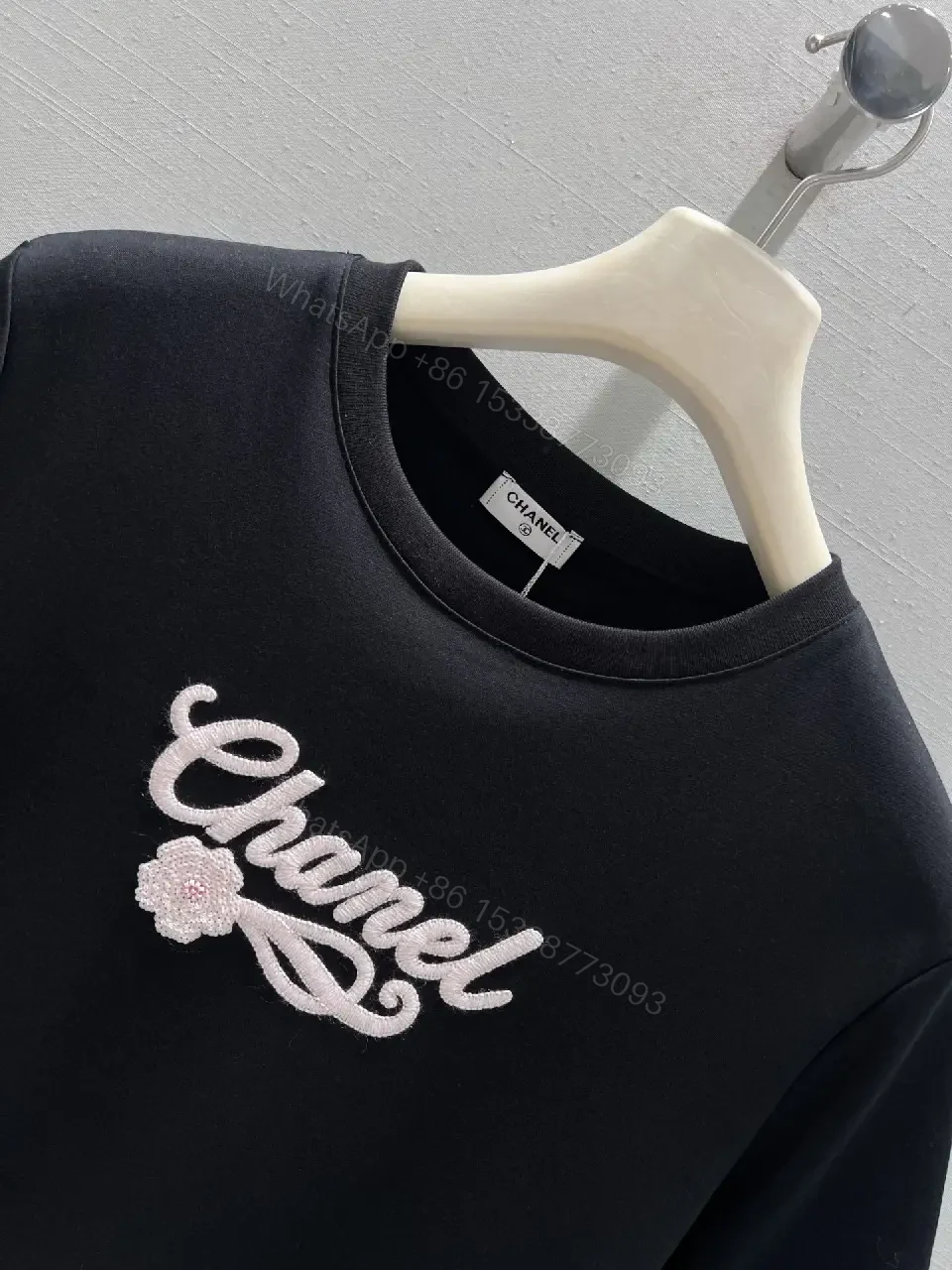 View 5 of Black Cotton Embroidered Logo T-Shirt - Subtle Luxury, Everyday Confidence
