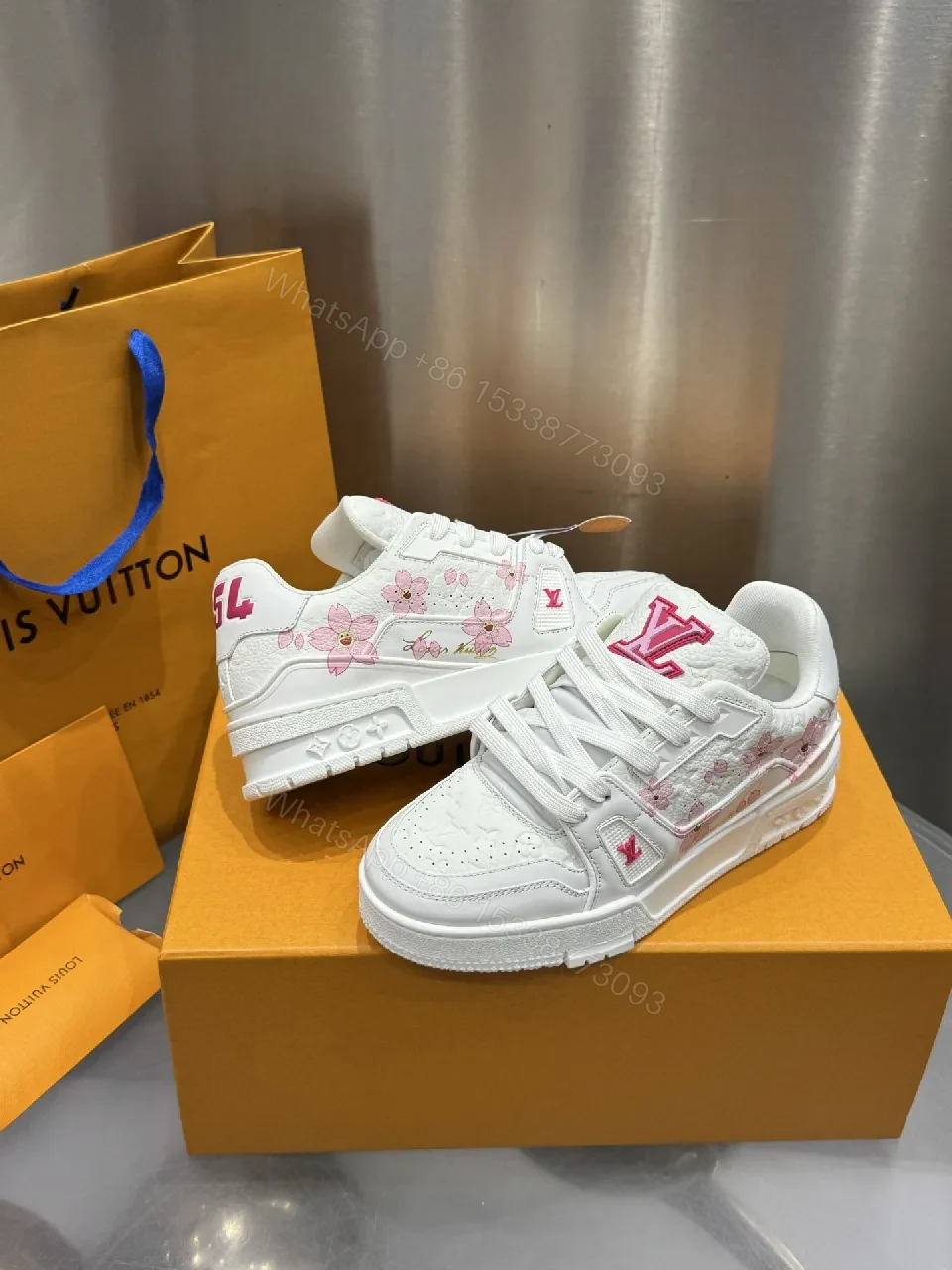 View 3 of White Leather Low-Top Trainer with Pink Embroidery Detail