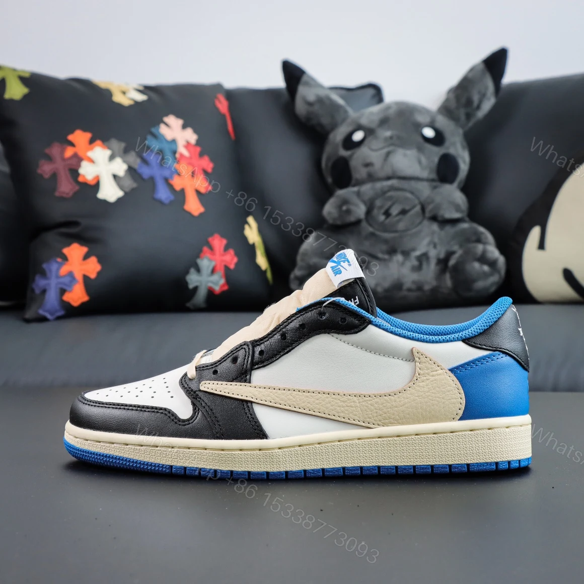 View 2 of Travis Scott Fragment Design Jordan 1 Reps Low​