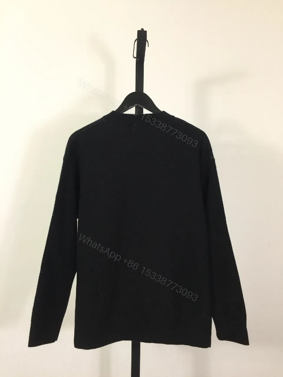View 6 of Bold Logo Knit with Iconic Graphic Detailing — Modern Sophistication Knit