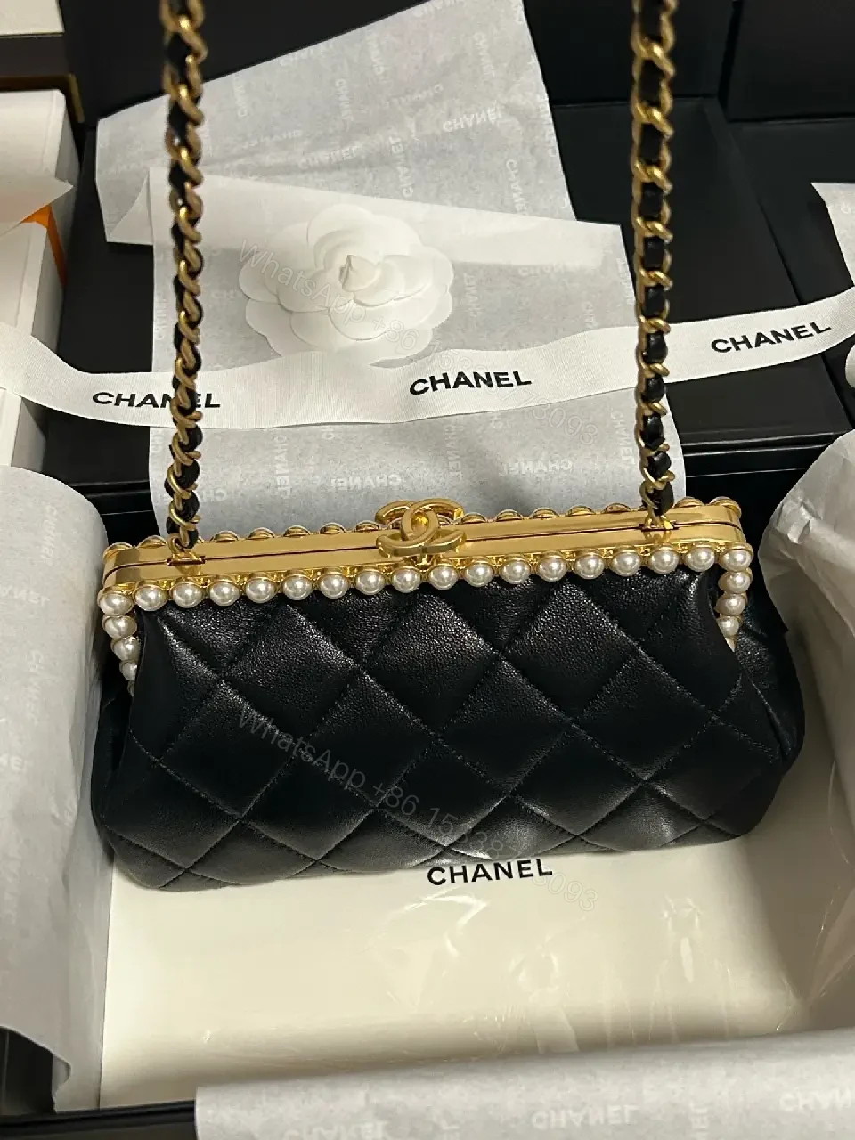 View 6 of Black Quilted Leather Clutch with Pearl Trim, Gold Frame, Elegant