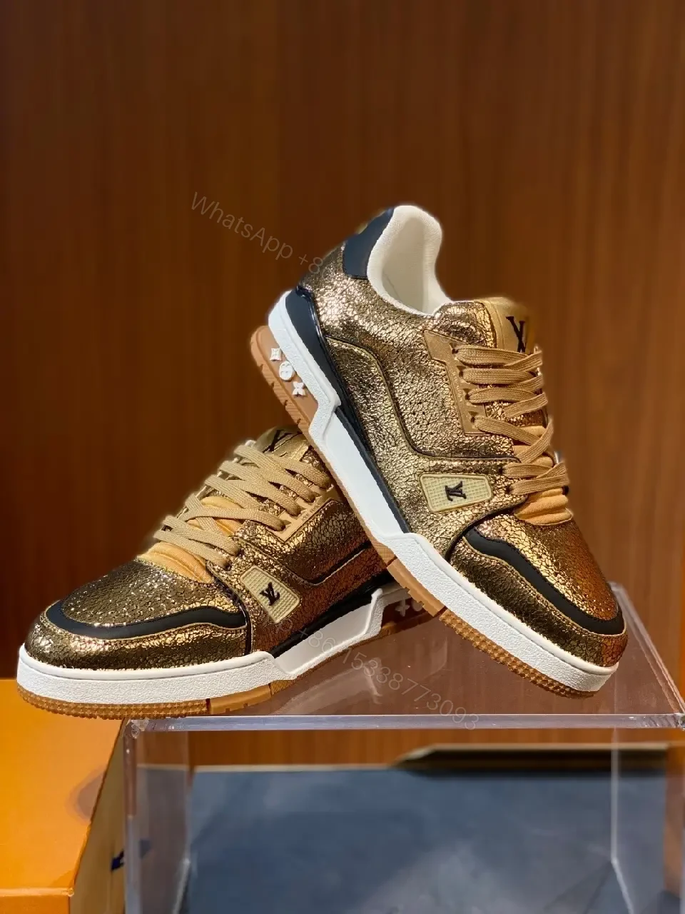 View 7 of Metallic Leather High-Top Sneakers with Subtle LV Detailing