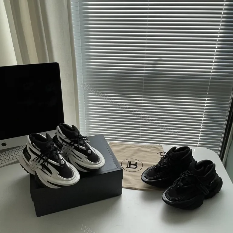 View 3 of Bold Black Balmain High-Top Sneakers: Sculpted Comfort