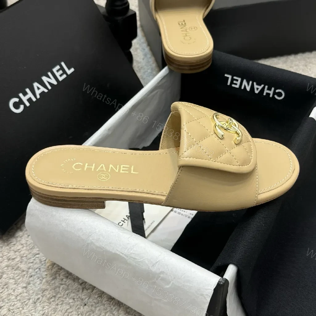 View 3 of Beige Quilted Leather Sliders with Gold Logo—Elegant Comfort