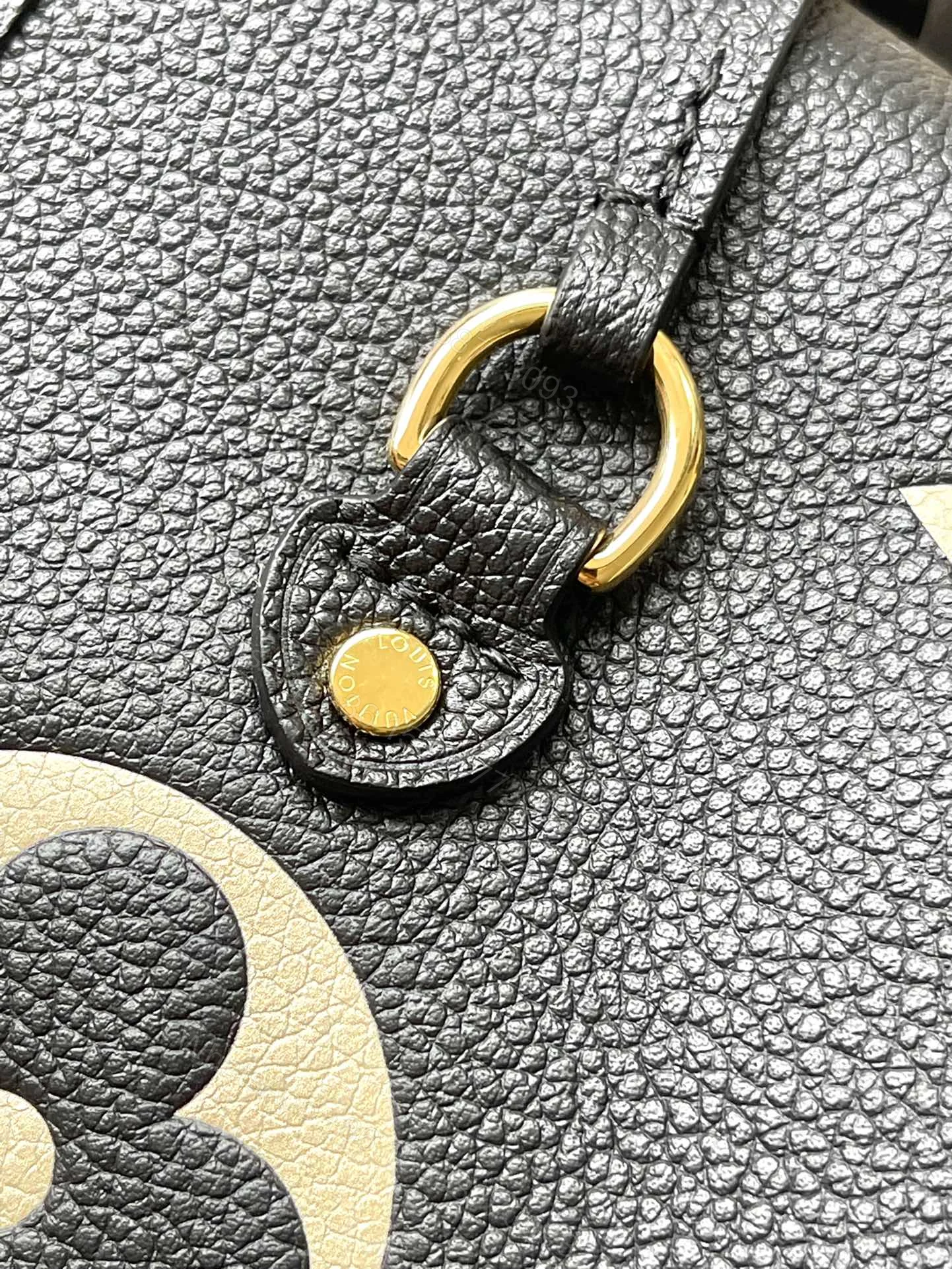 View 8 of LV NEVERFULL MM IN BLACK CREAM MONOGRAM EMPREINTE LEATHER