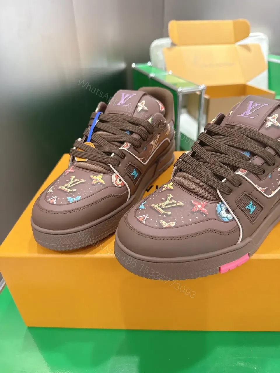 View 8 of Bold Patterned Sneakers with Monogram Flair - High-Top Comfort