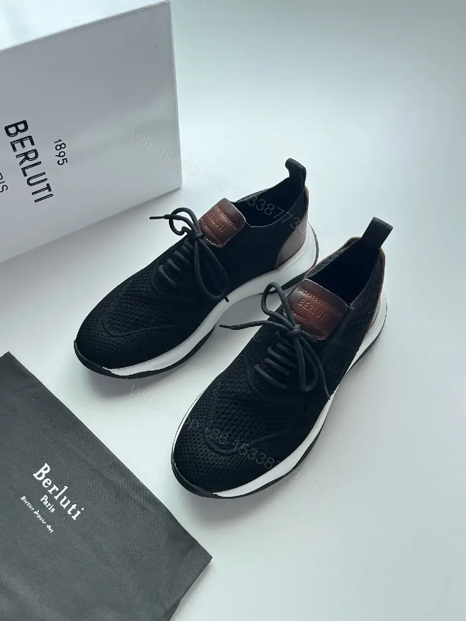 View 8 of Black knit sneakers with leather trim for everyday luxury and comfort