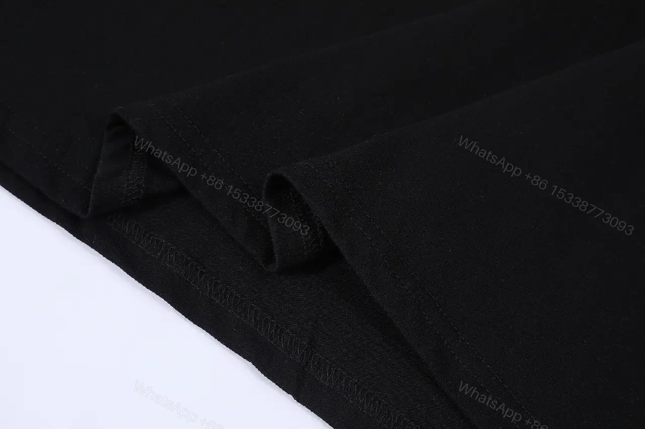 View 7 of Black Cotton Minimalist Tee – Subtle Chest Logo, Premium Essential