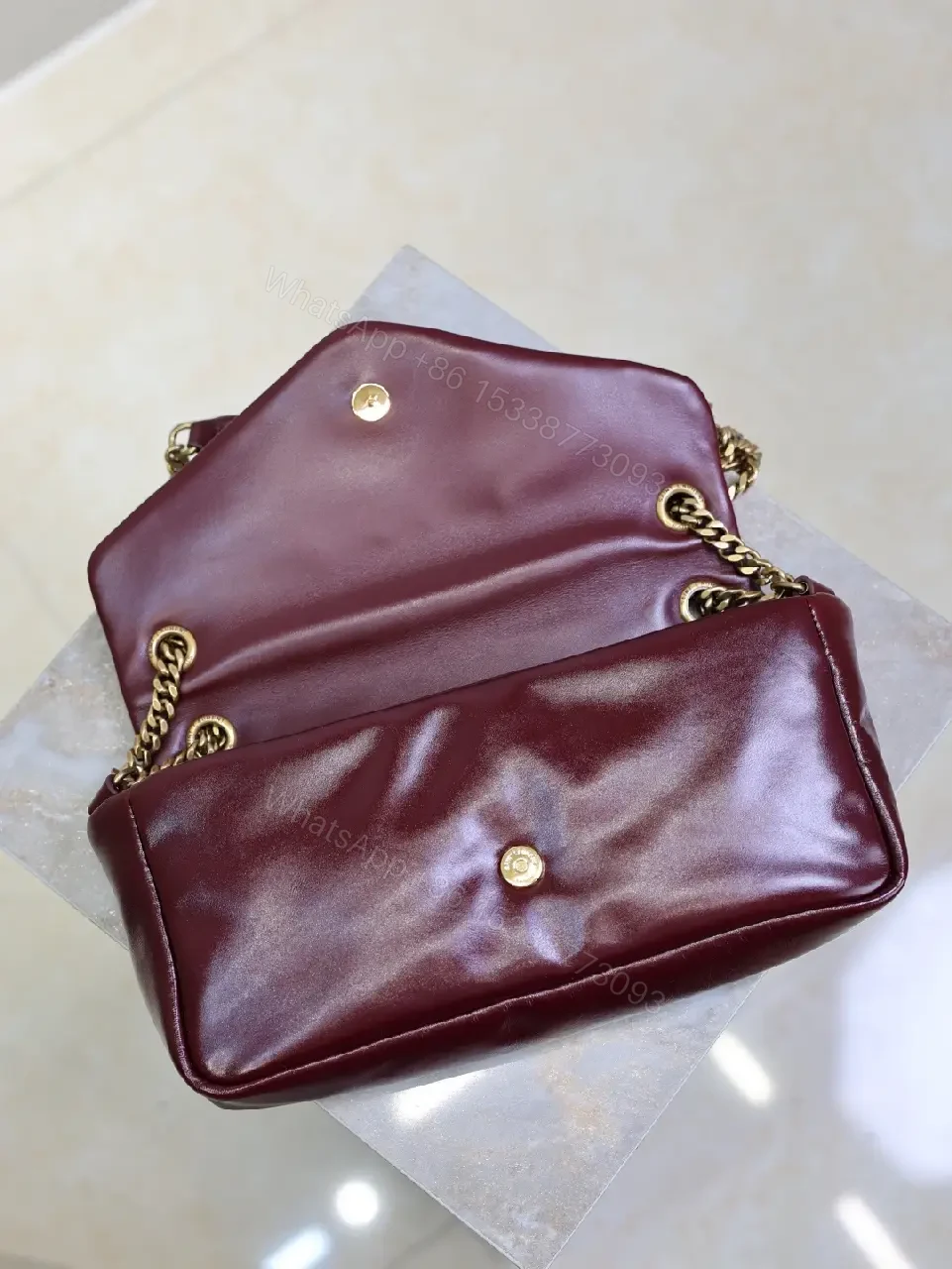 View 7 of Burgundy Calfskin Compact Shoulder Bag with Gold Hardware