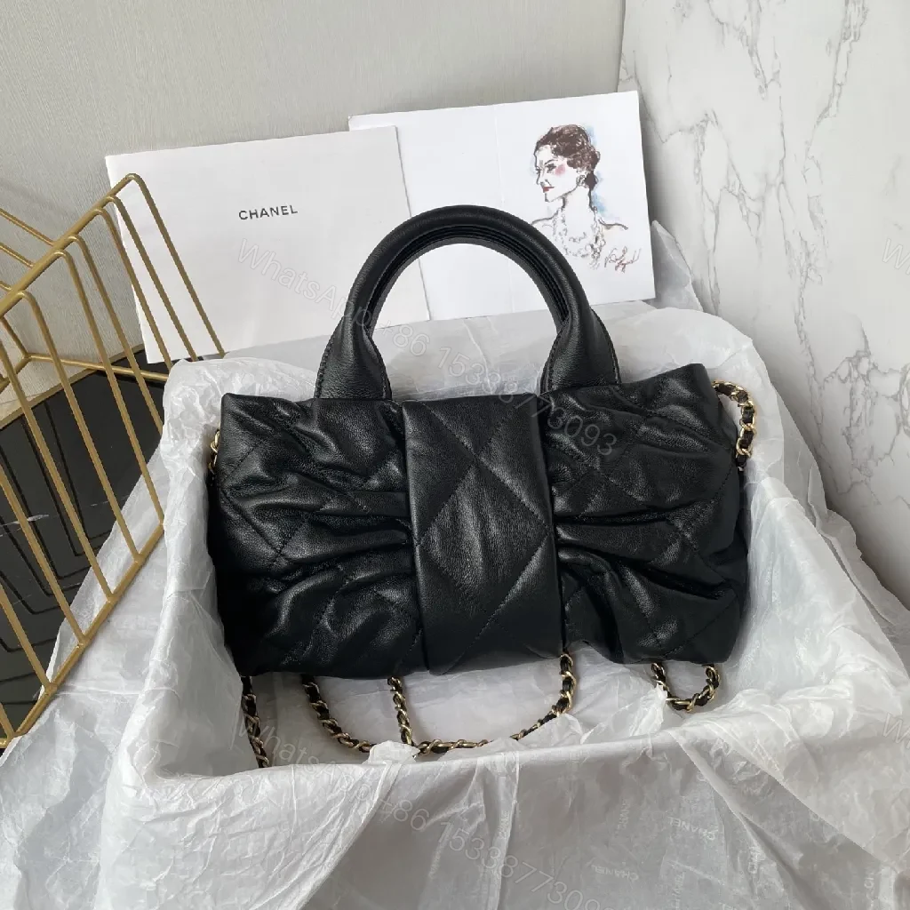 View 5 of Quilted Black Leather Handbag with Gold Hardware - Chic Style